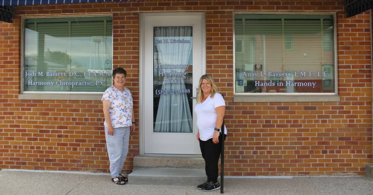 Jodi and Amy Bassett in front of Harmony Healing Arts in Stuart, Iowa